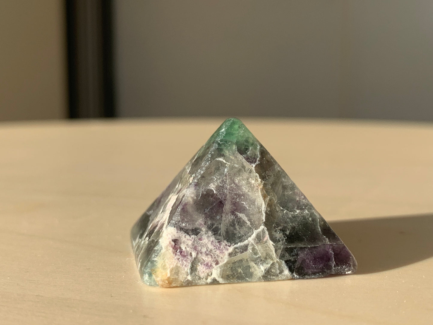 a - rainbow fluorite pyramid
