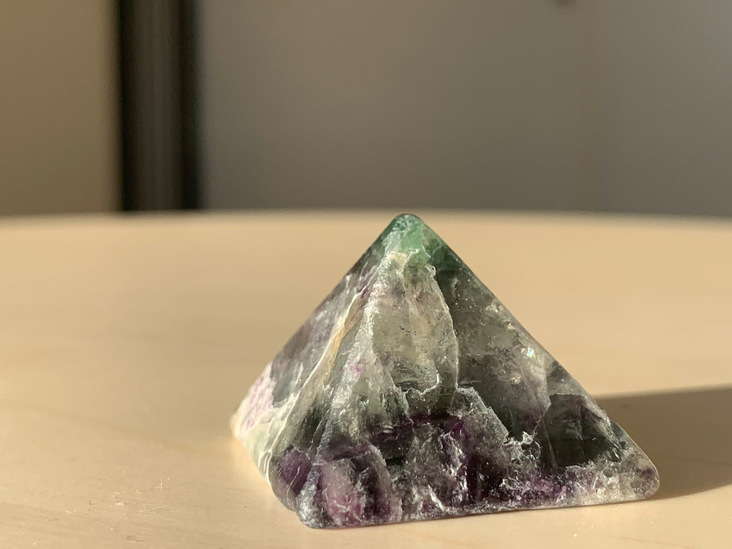 a - rainbow fluorite pyramid
