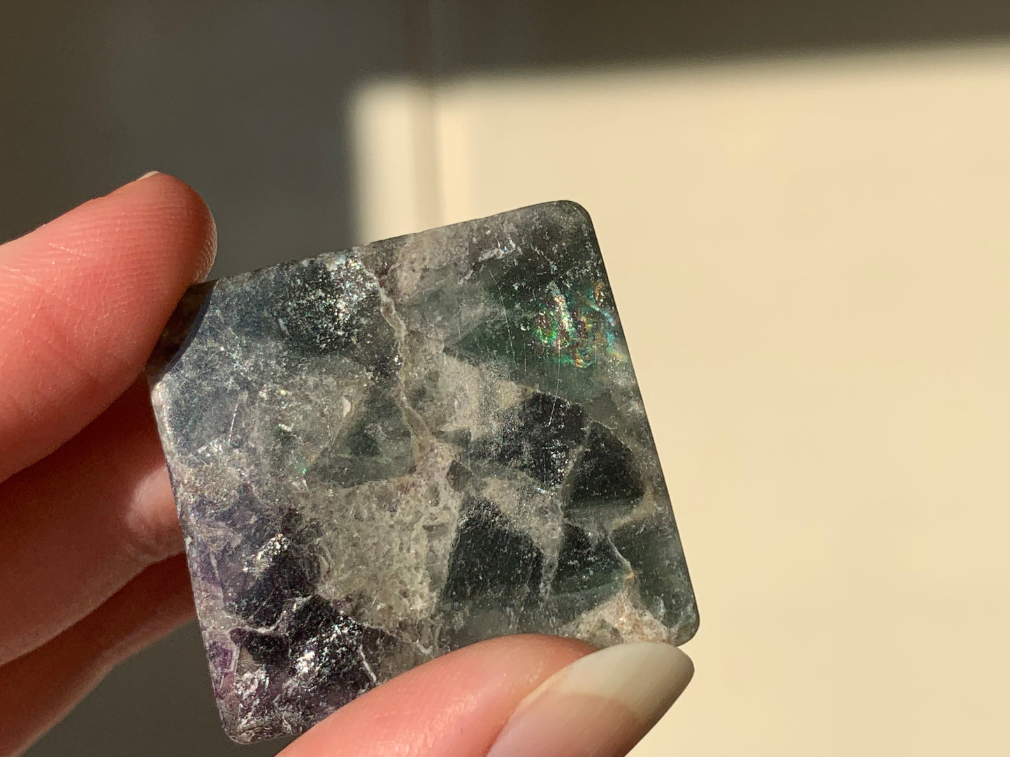 a - rainbow fluorite pyramid