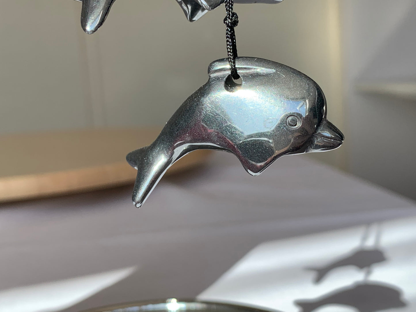 hematite dolphin necklace